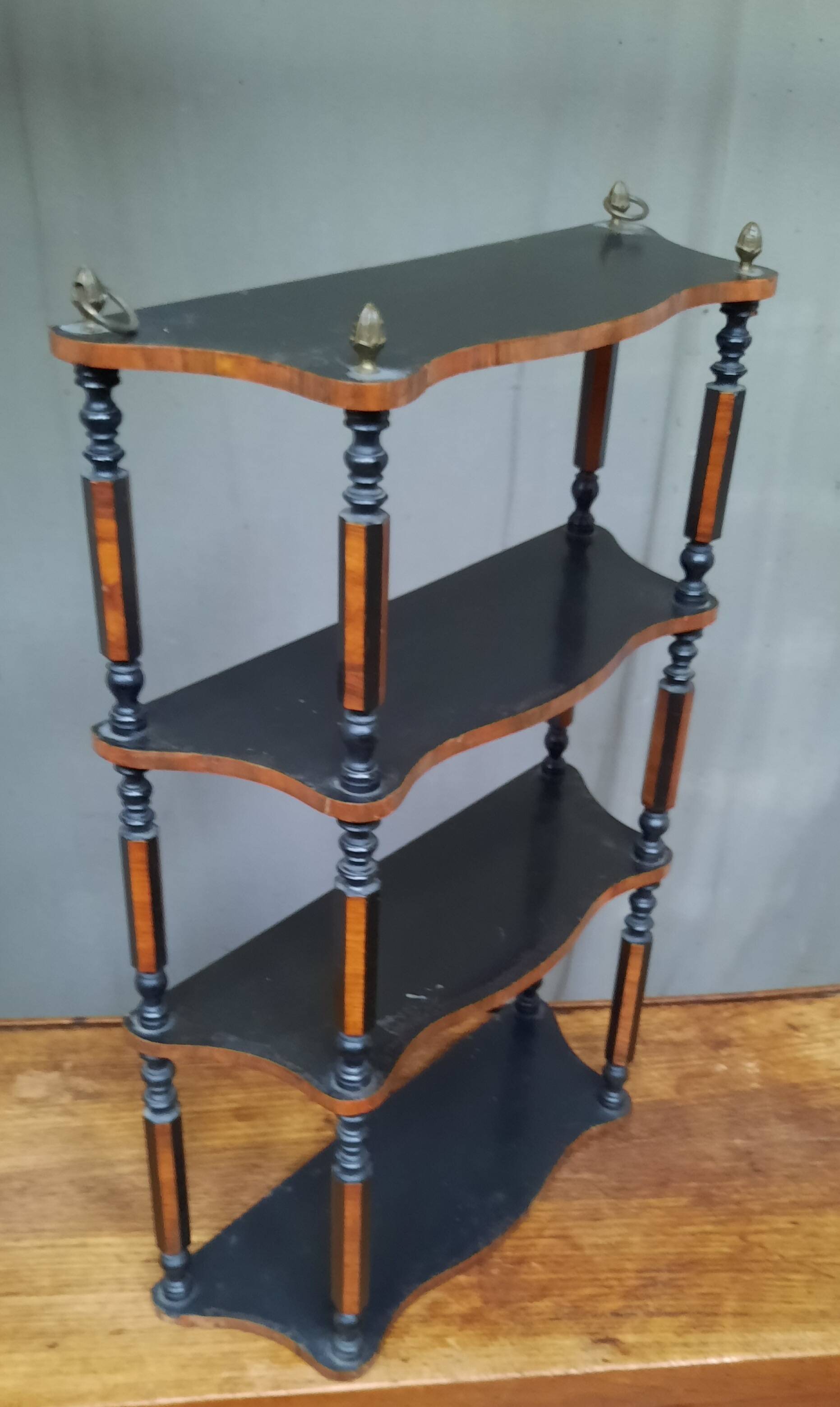 Blackened wooden wall shelf