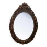 Renaissance oval mirror with bird