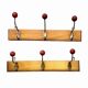 Pair of vintage wooden wall coat racks with three red ball hooks