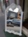 Miroir baroque en bois sculpte et patine en blanc