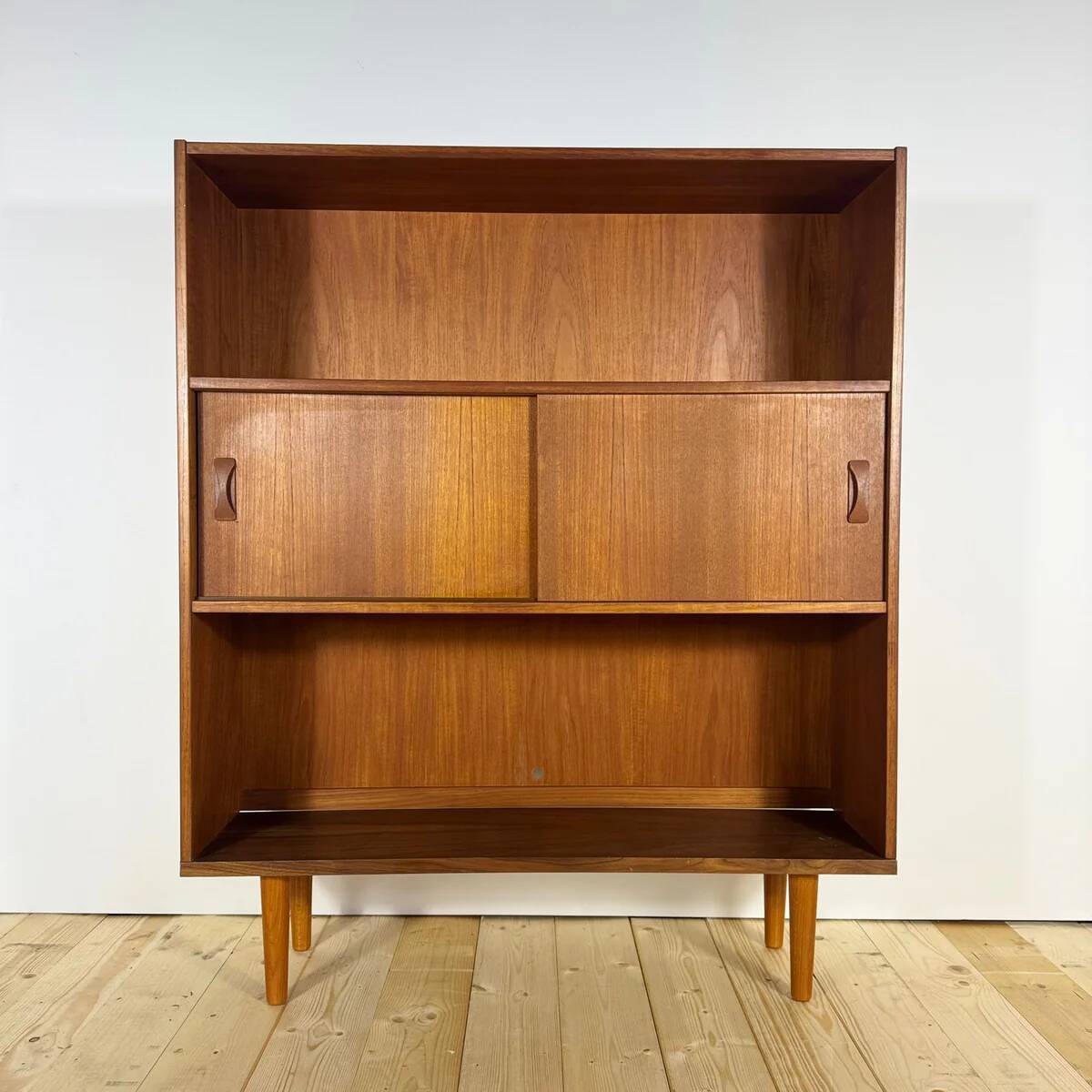 Danish teak bookcase from the 1960s with sliding doors
