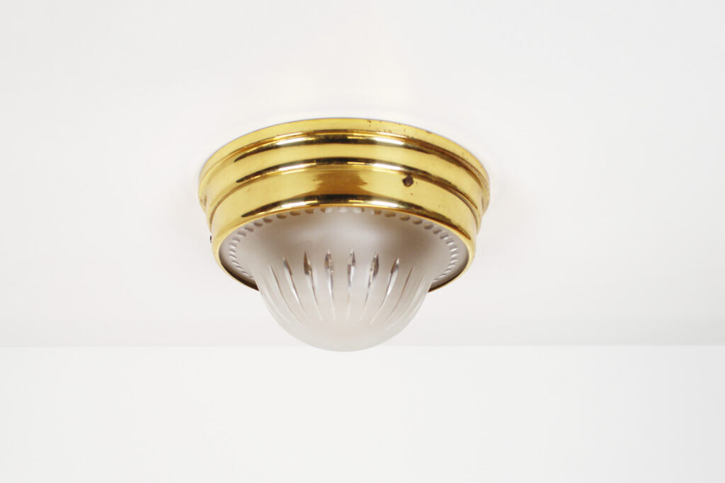 Single vintage brass ceiling light with glass globe
