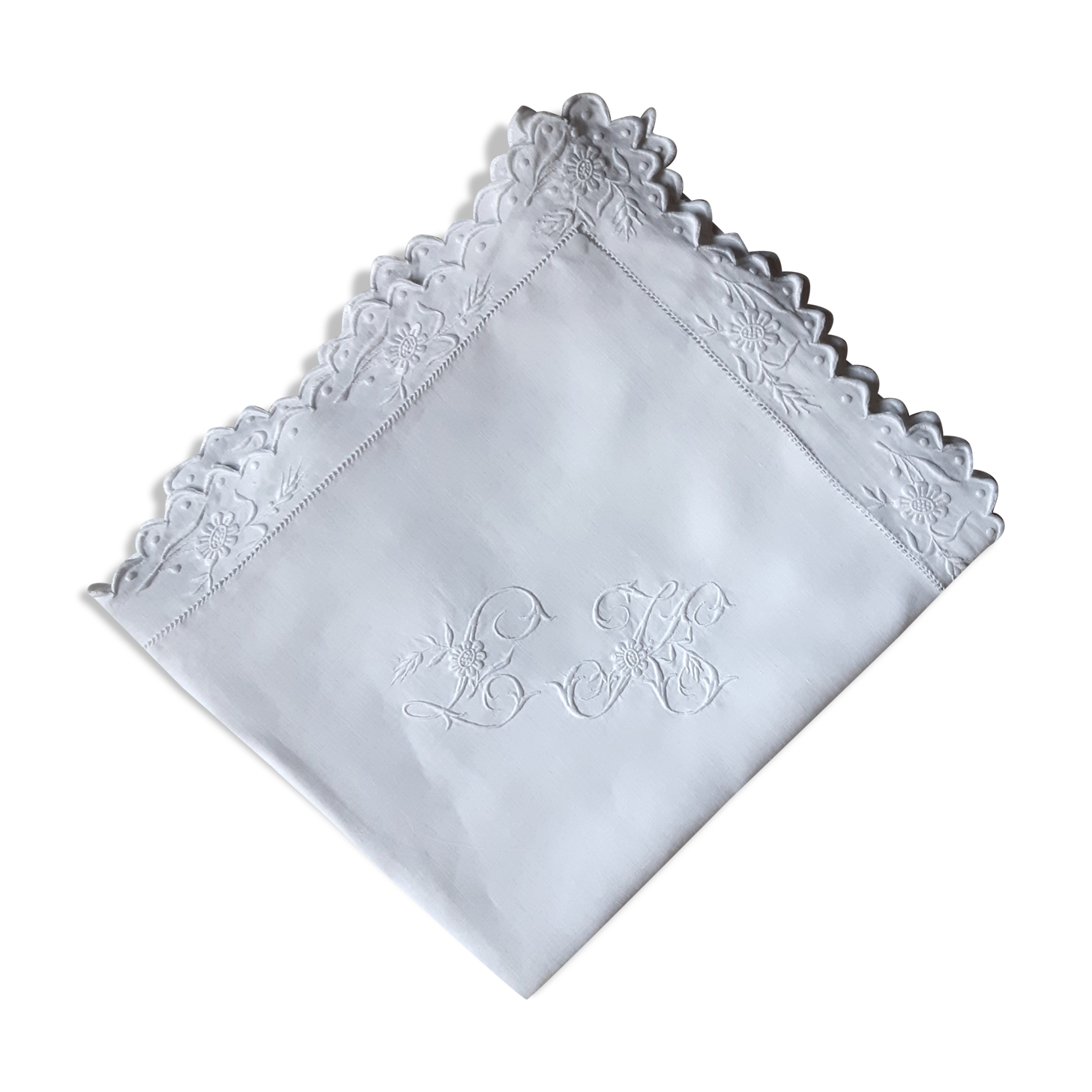 pillowcase embroidered with flowers and monogrammed festoons LK
