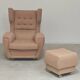 Beige wingback armchair and TVAR footrest, former Czechoslovakia.