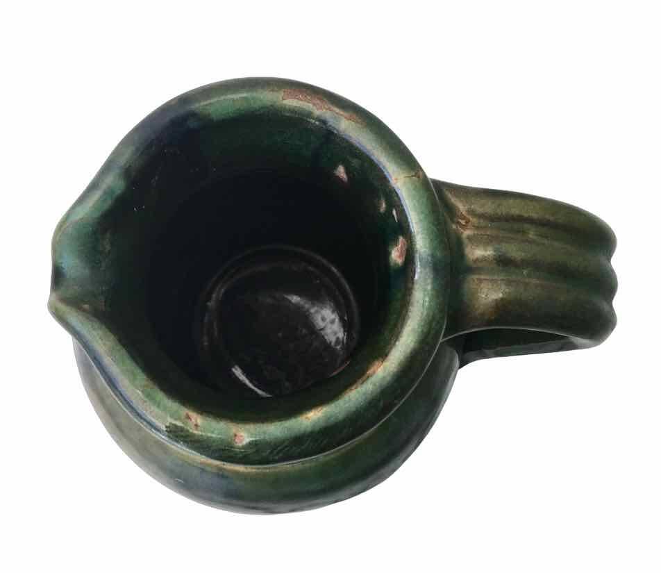 Vintage enameled terracotta pitcher