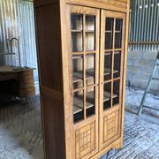 Vintage oak bookcase from the reconstruction period with 2 doors with small panes.