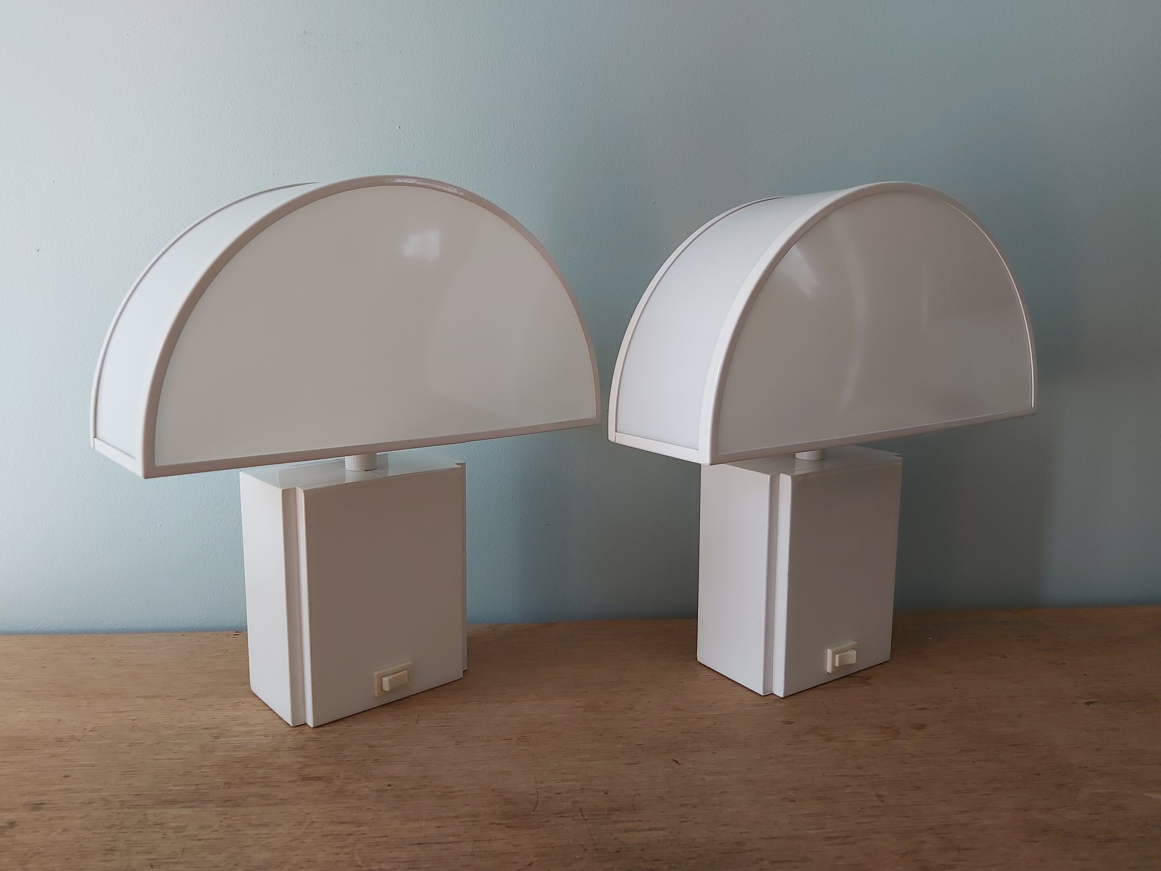 Pair of wall lamps, Olympus model, Harvey Guzzini, 70s