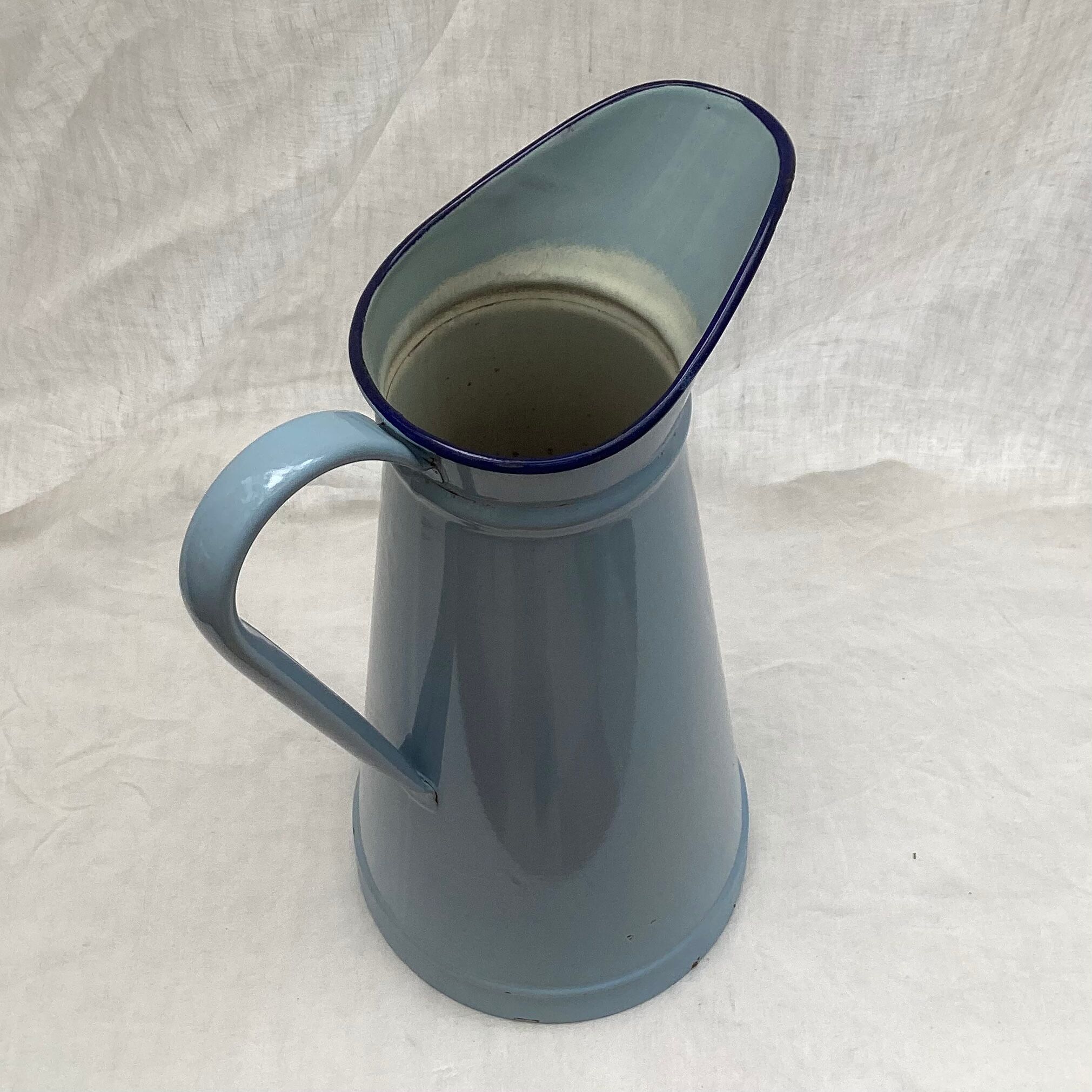 Old broc in enamelled sheet metal light blue color