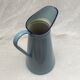 Old broc in enamelled sheet metal light blue color