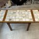 Extendable table in wood and mosaic