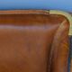Vintage two-seater leather sofa