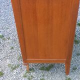 Vintage oak commode with tapered legs and wings from the 1950s.