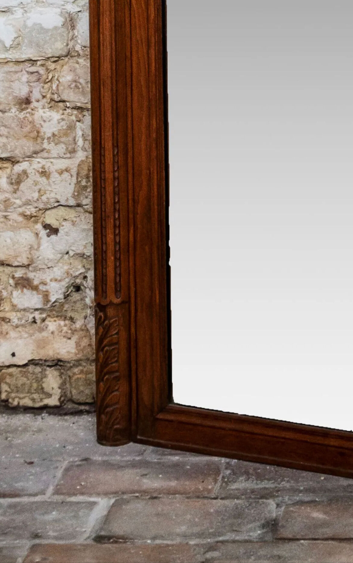 Beveled mirror in carved oak early twentieth century