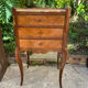 Old wooden bedside table