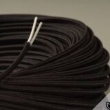 Turned wooden lamp base, fabric cable