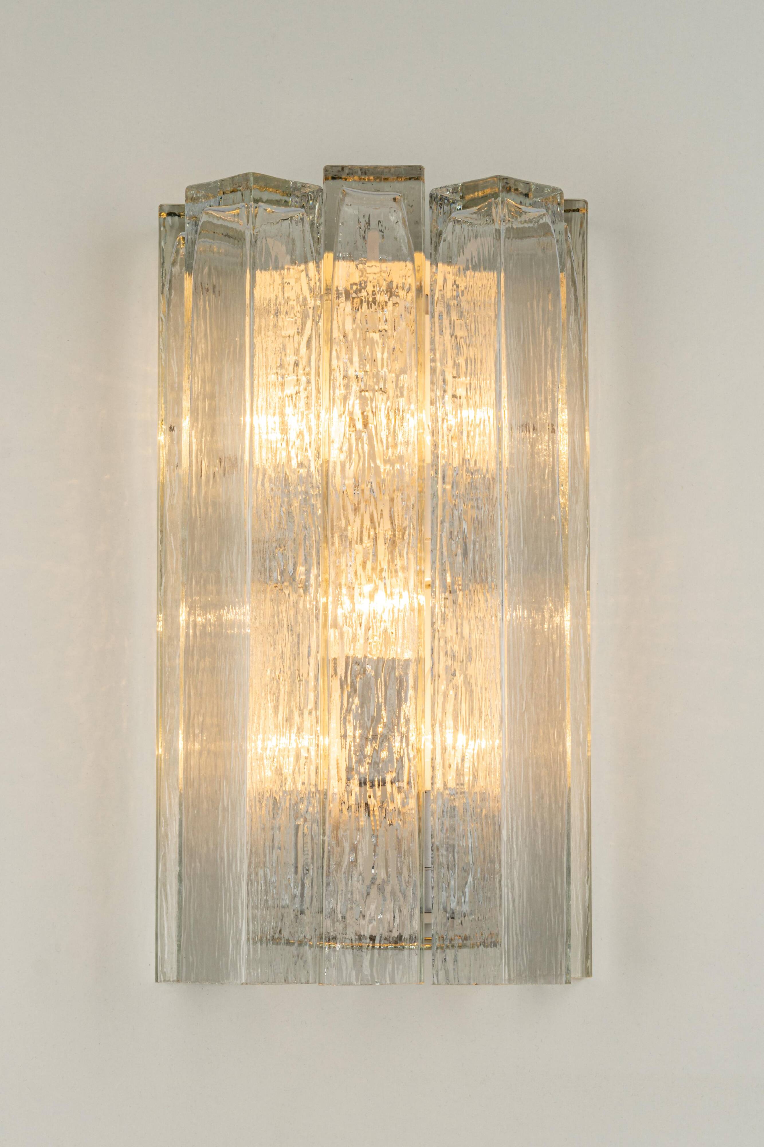 Large pair of wall sconces in brass and Murano glass by Doria, Germany, 1960s.