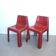 Pair of red fibreglass chairs from the 1970s.