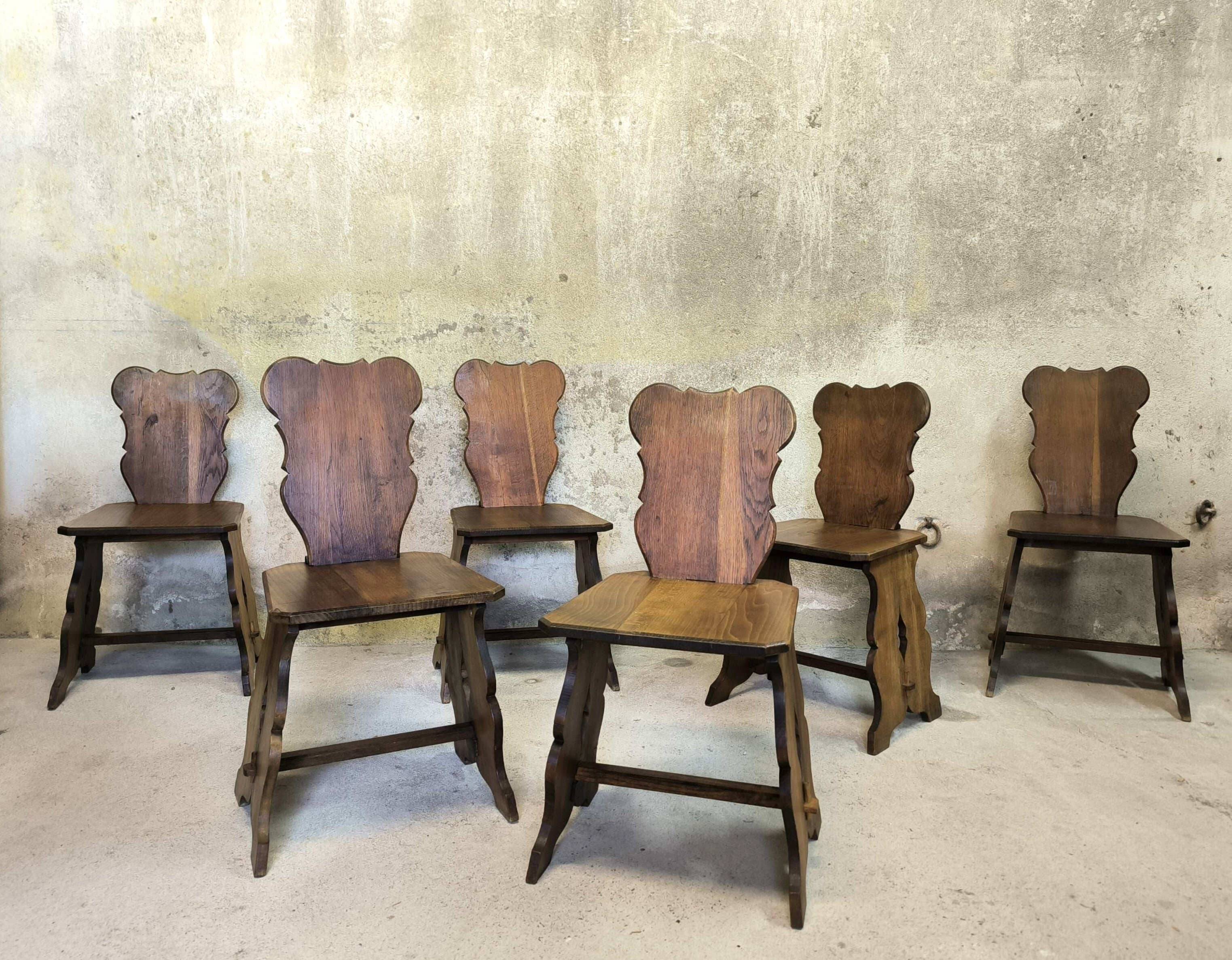 Set of six vintage brutalist wooden chairs.