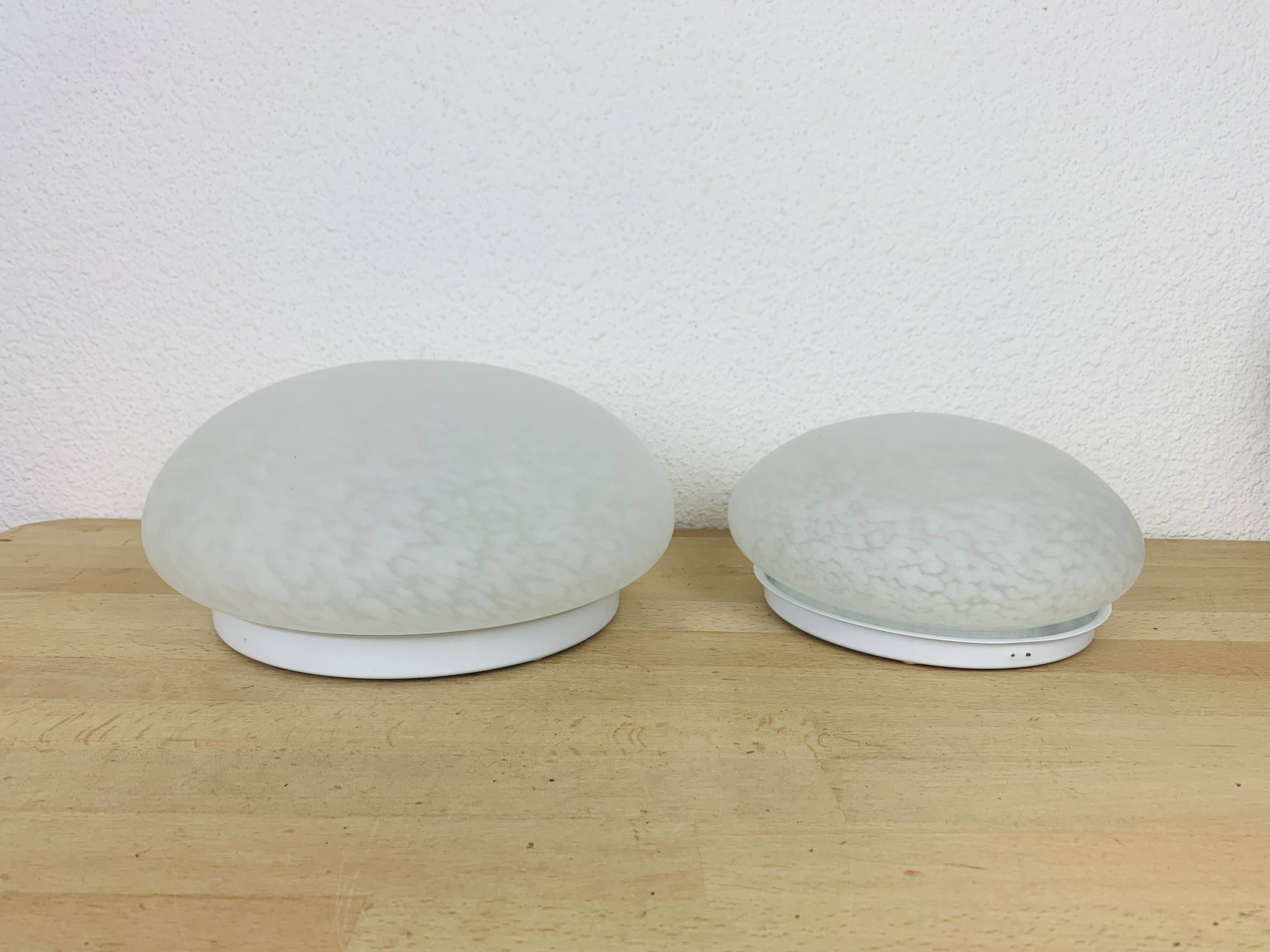 Pair of speckled glass ball wall lights from Vianne, half sphere