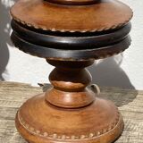 Foot of turned wooden lamp and carved