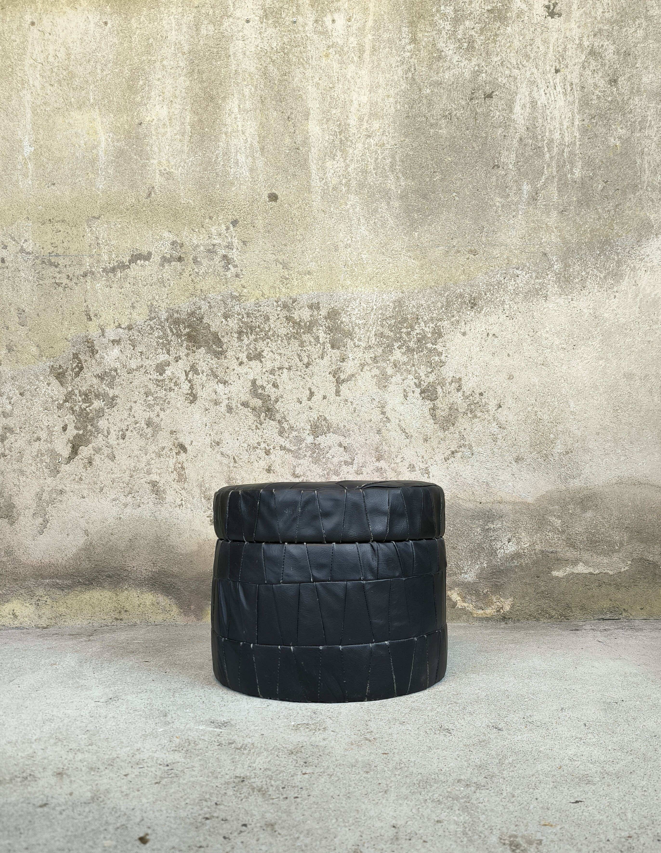 Vintage De Sede black leather storage pouf.