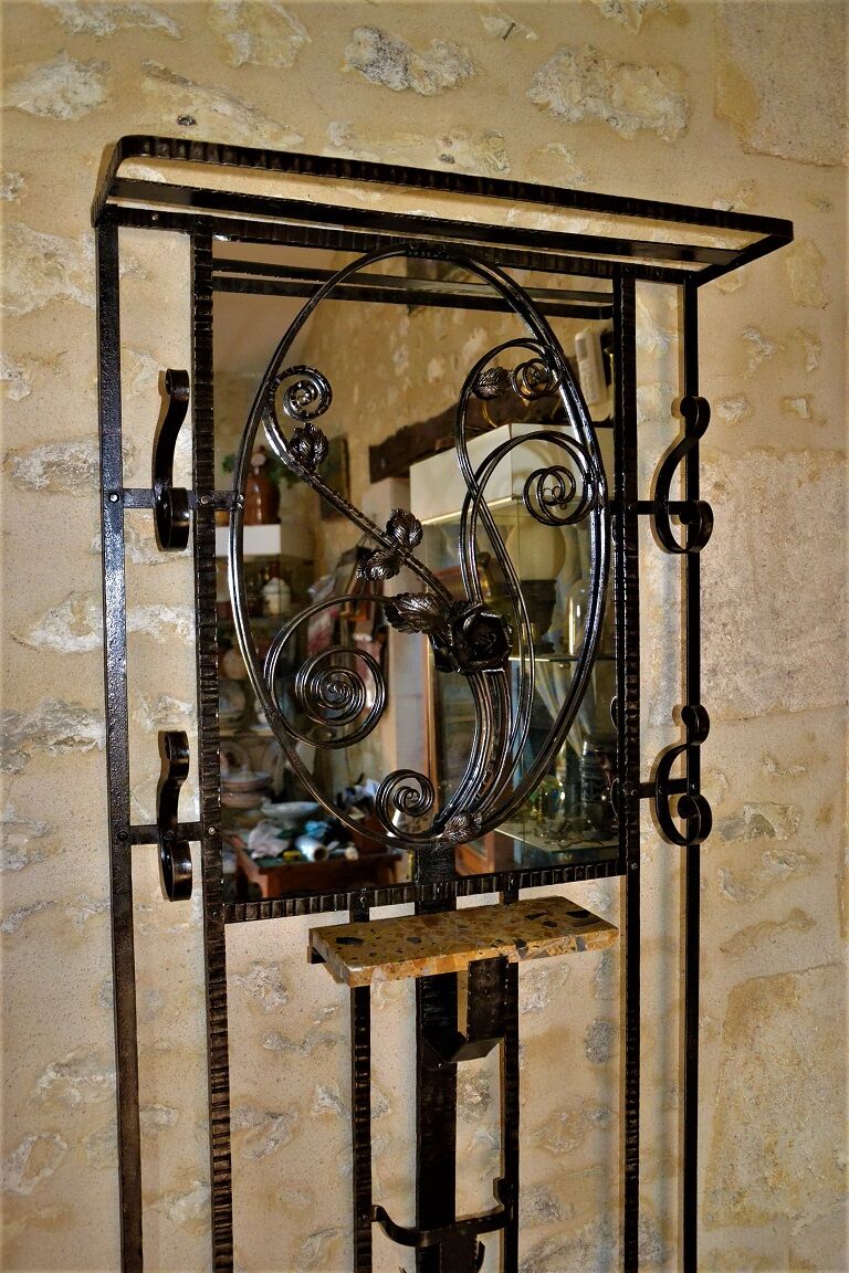 Wrought iron wardrobe with oval mirror