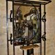 Wrought iron wardrobe with oval mirror