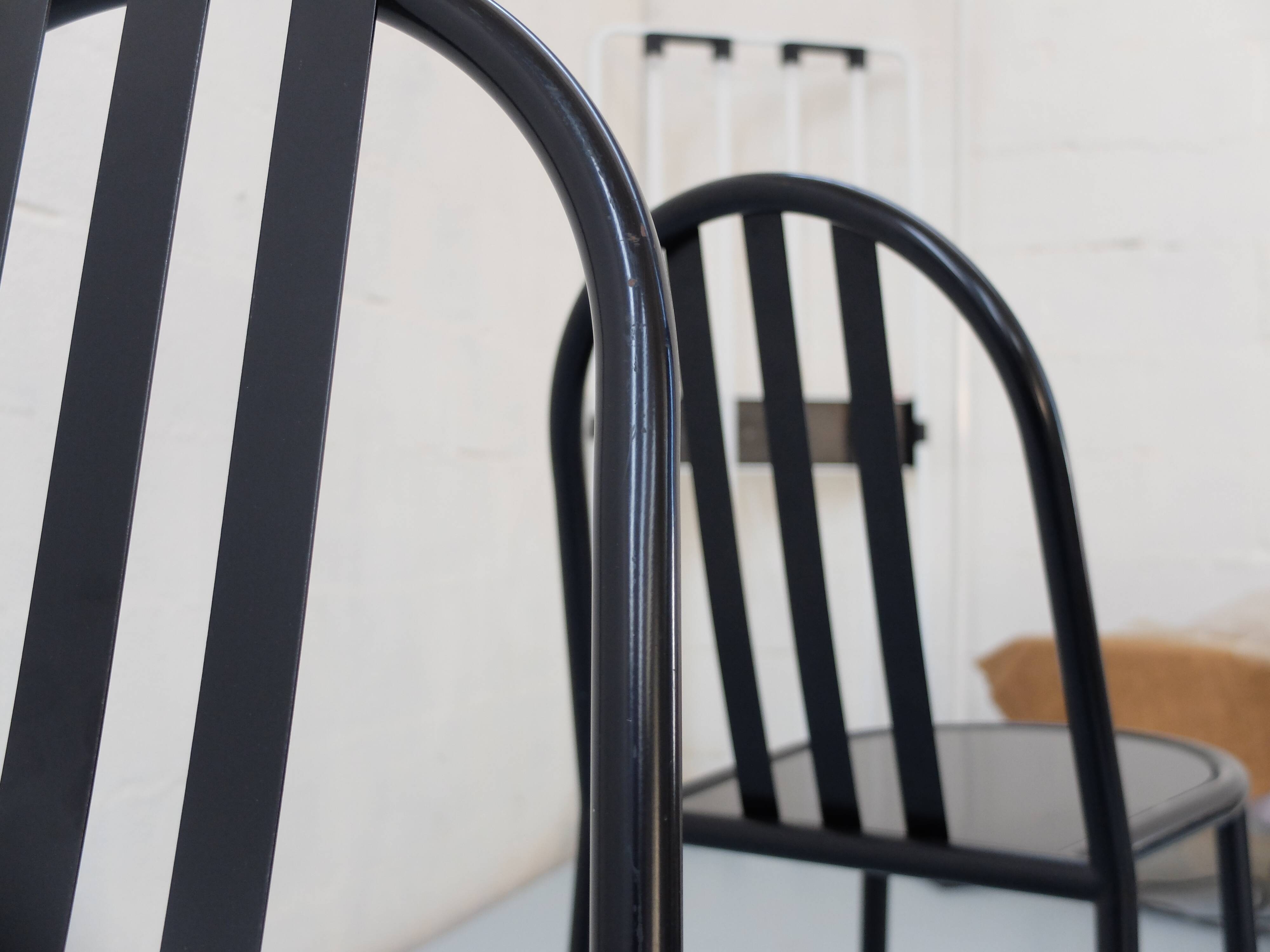 4 robert mallet-stevens black lacquered steel chairs, stamped rms ecart
