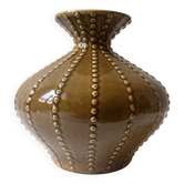 Pyriform vase in glazed ochre ceramic and beads.