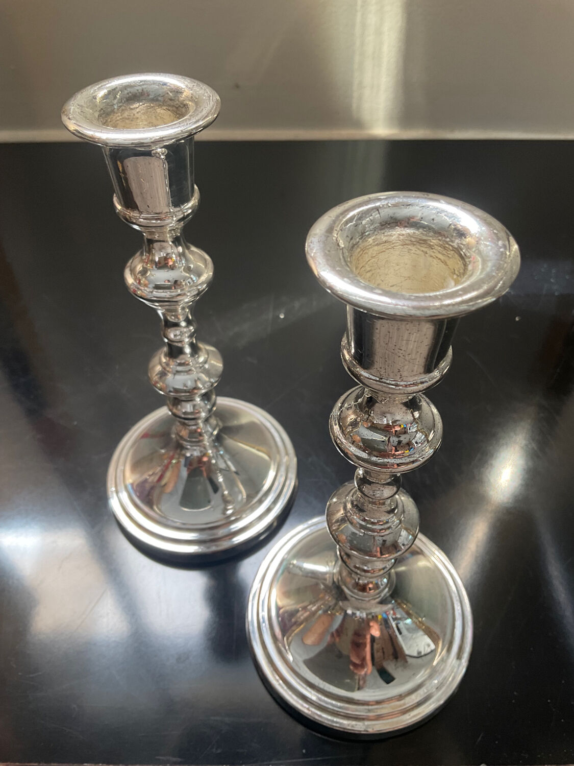 Pair of vintage candle holders torches in silver metal