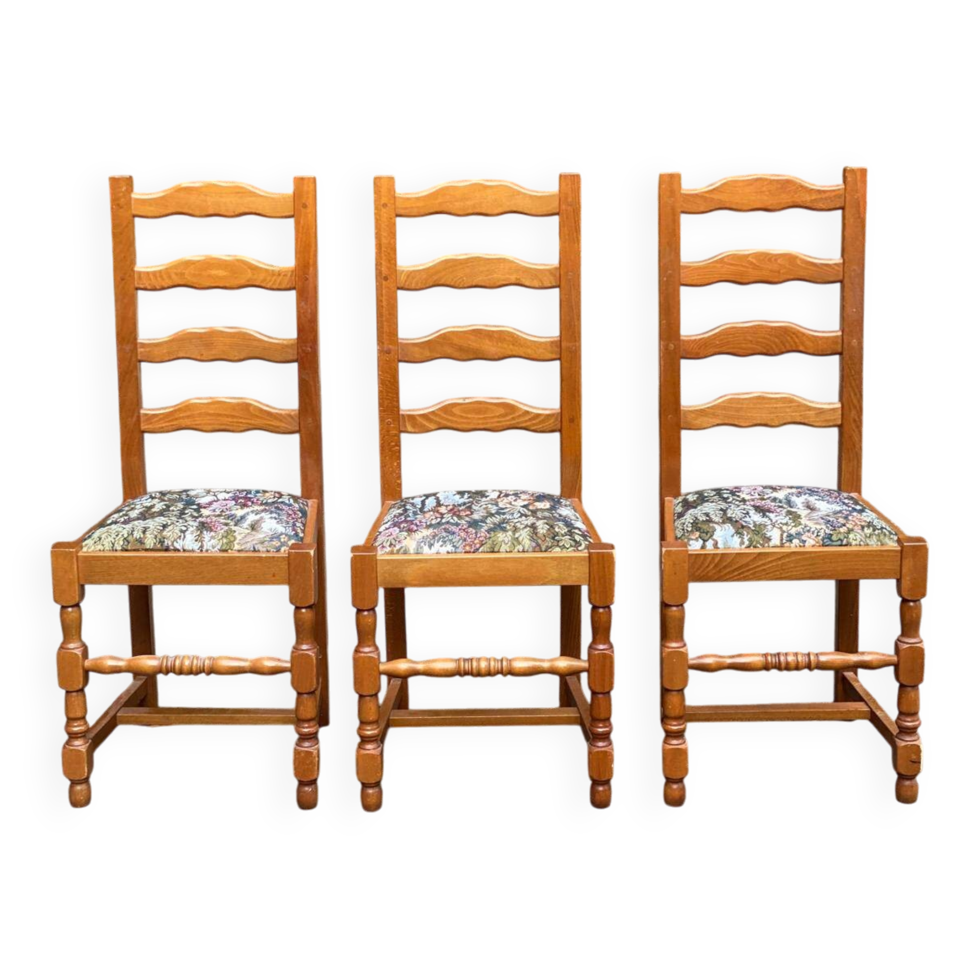 3 solid wood chairs with embroidered fabric
