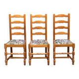 3 solid wood chairs with embroidered fabric