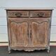 Antique chest of drawers with a cerused and patinated finish.