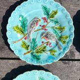 4 anciennes assiettes en barbotine décor oiseaux en faïence de Sarreguemines