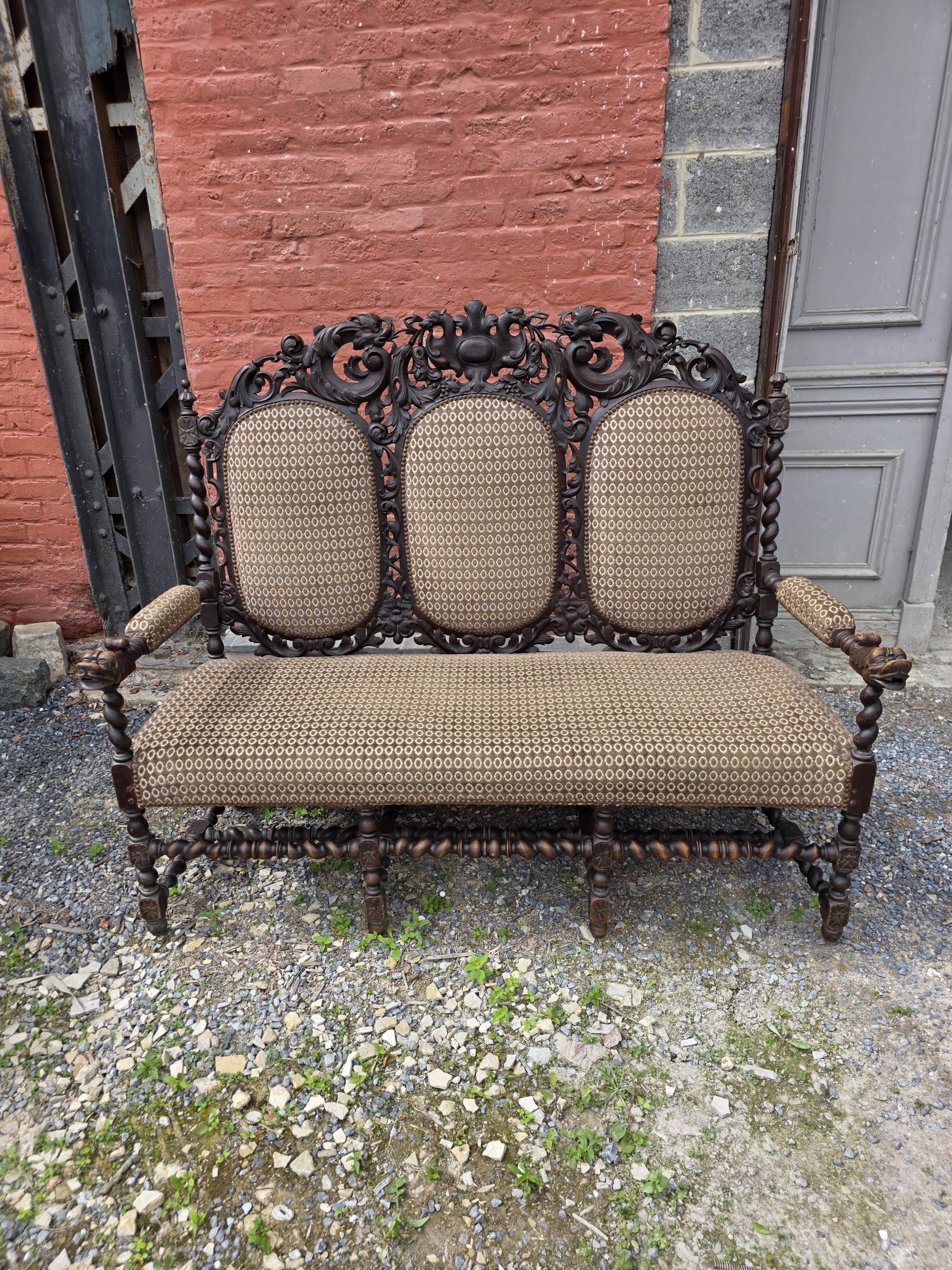 Three-seater armchair in Louis XIII style made of oak from the 19th century.