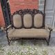 Three-seater armchair in Louis XIII style made of oak from the 19th century.
