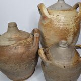 Set of three ancient ladies-jeannes in enamelled terracotta