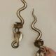 Pair of Egyptian Revival Style Engraved Brass Cobra Sconces