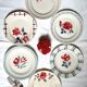 Old flat plates mismatched in earthenware