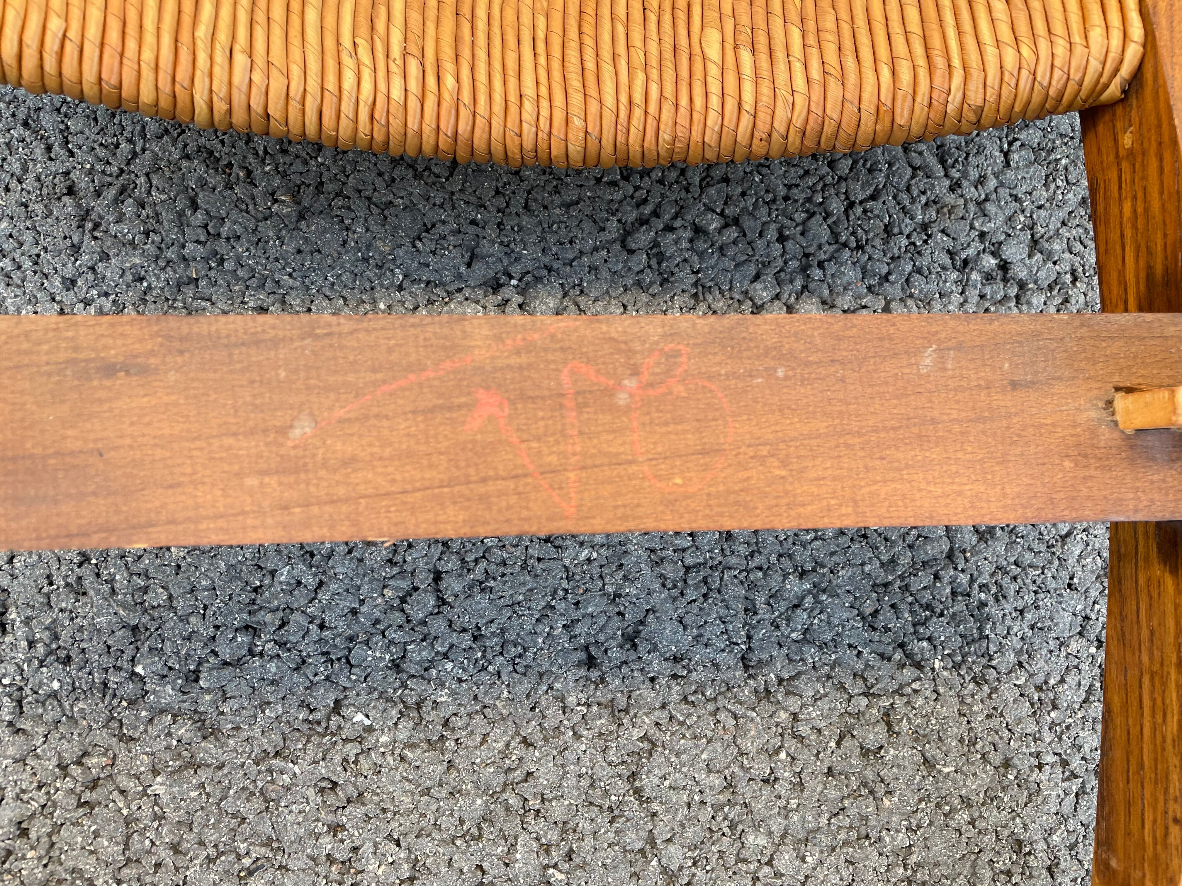 Vintage armchair in straw and brutalist wood