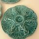 Dish and 4 turquoise faience oyster plates from Gien, France.
