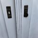 Vintage two-door wardrobe in painted white wood — late 19th century Hungarian style.