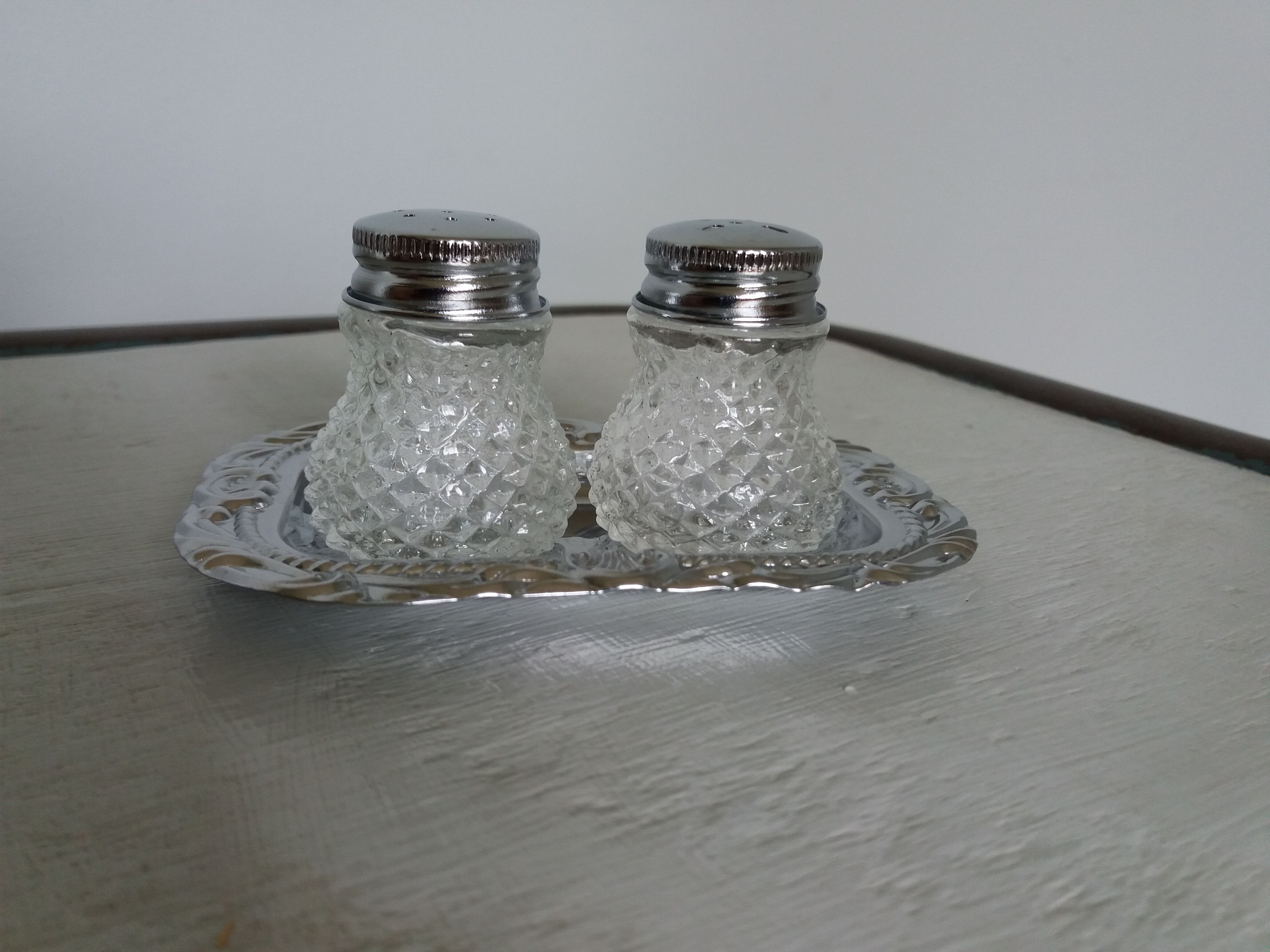 Salt shaker and pineapple shaped pepper