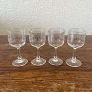 Four antique stemmed liqueur glasses in engraved crystal, 19th century