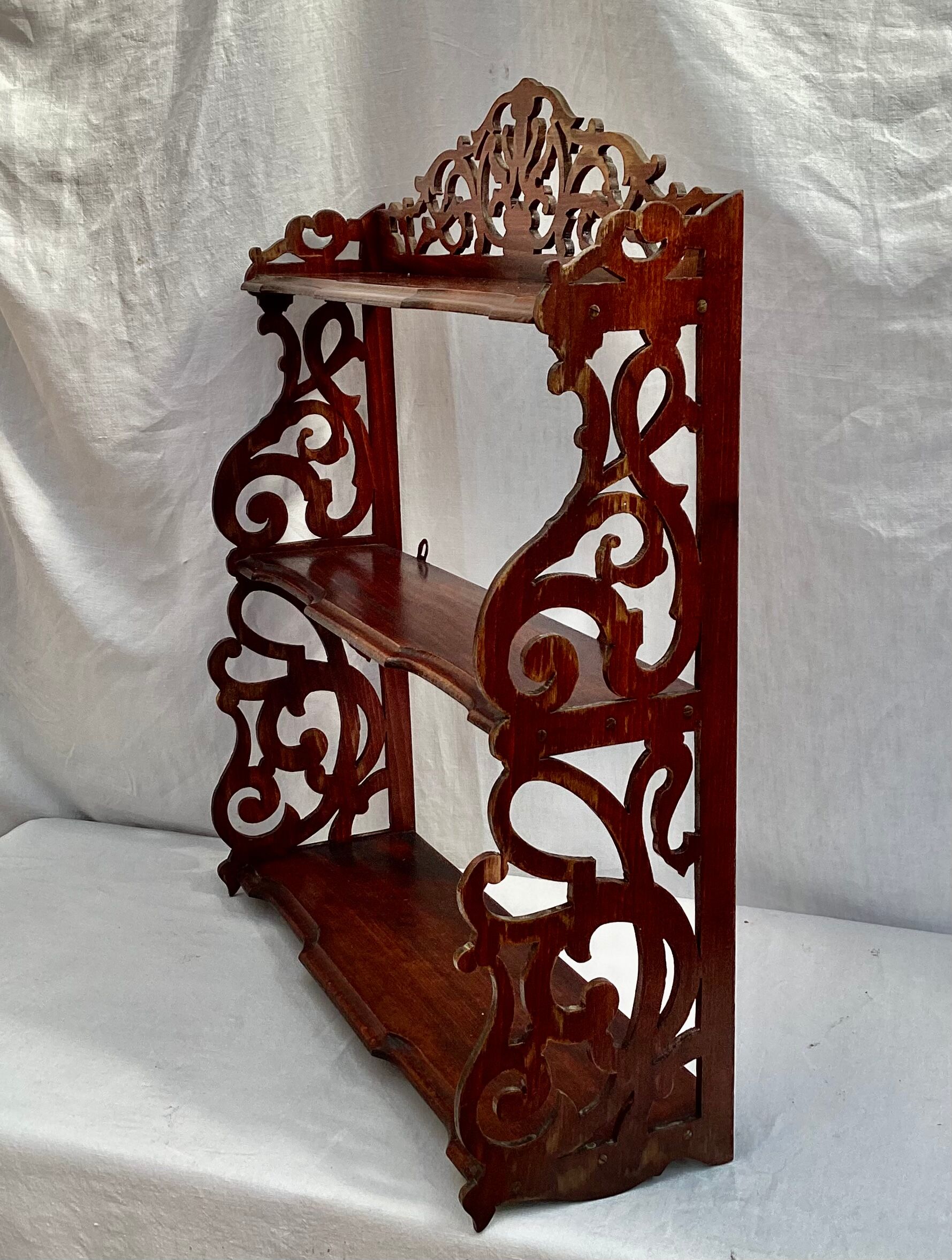 Old wall shelf in worked wood dimension: height -67cm- width --55cm-