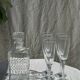 Set of 5 glass champagne flutes with twisted ribbed base