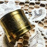 Four rounds of old brass towel around 1930