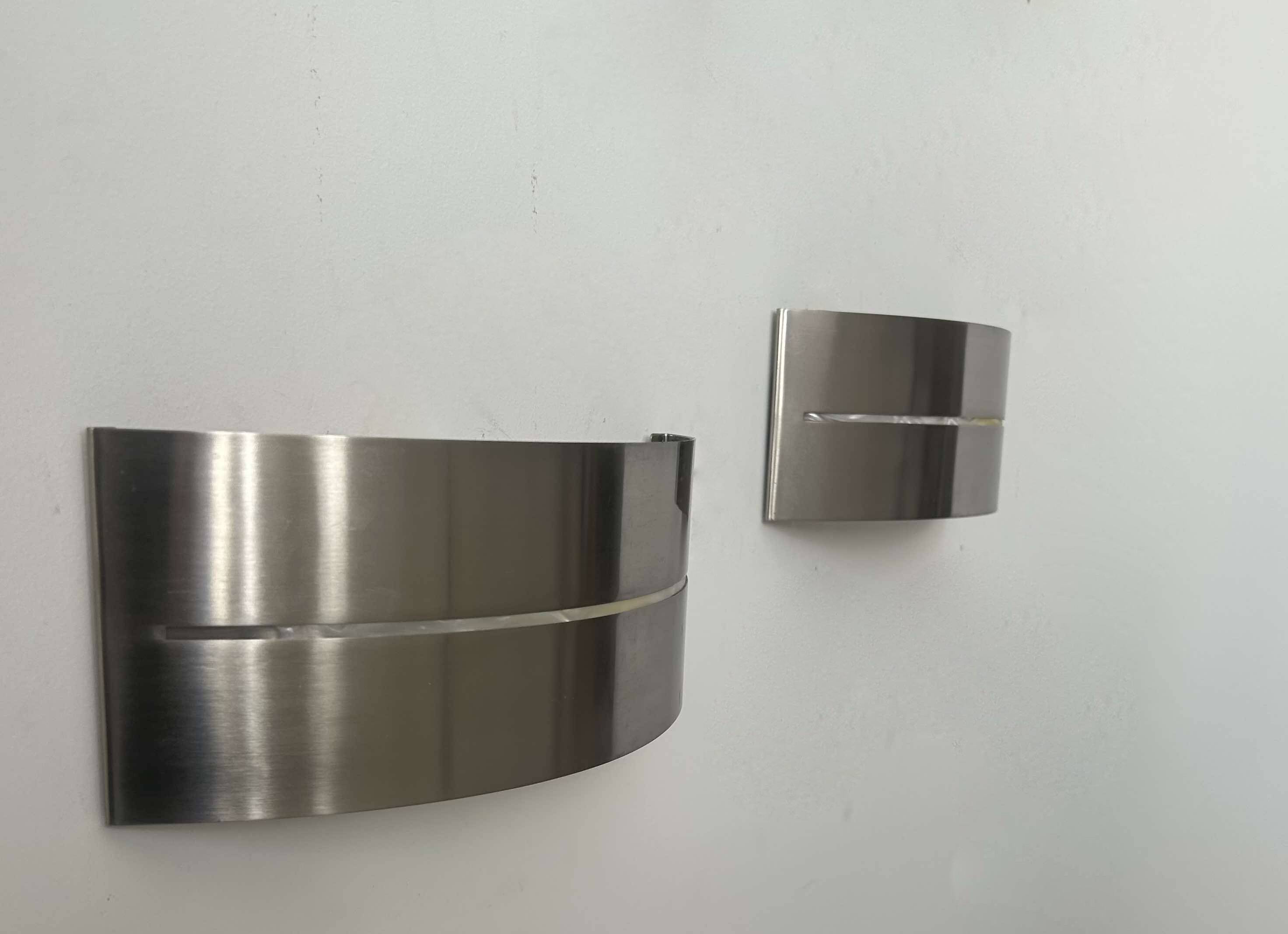 Pair of vintage wall lights, brushed metal, France 1980.