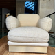 Pair of armchairs by Thibier in brass and wool France 1978
