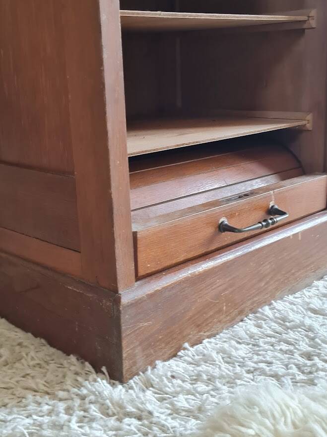 Vintage double curtain filing cabinet.